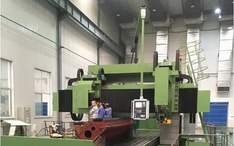 杭機(jī)股份12米大型(xíng)數控動梁龍(long)門導軌磨床(chuang)順利交付